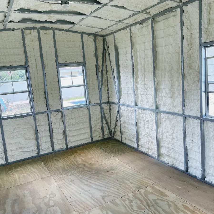 Closed-cell spray foam insulation applied to wall cavities in a residential project in Fort Lupton